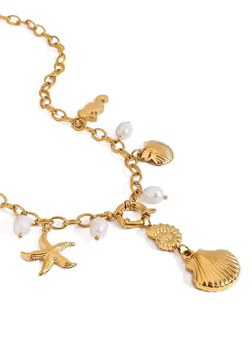 Ketting-goud-bedeltje-zeepaard-schelpjes