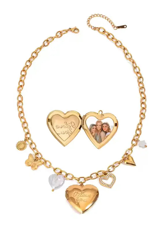 Bedelketting met hart parels en vlinder eigen foto