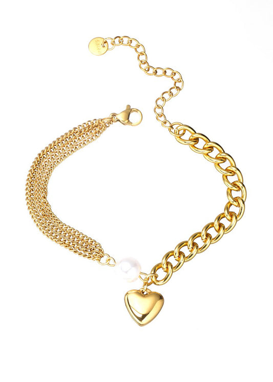 Armband goud breed met bedel hart en parel