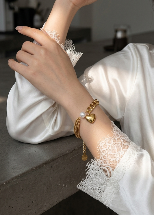 Armband goud rvs met bedel hart en parel