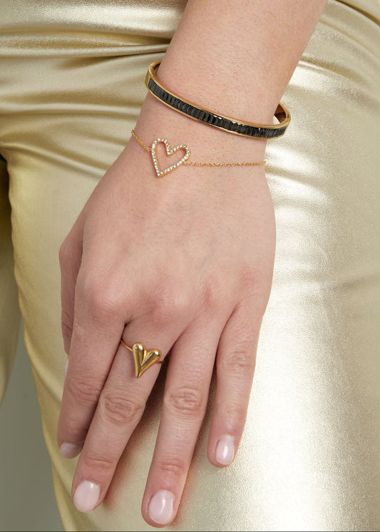 Armbandje goud open hartjes met steentjes