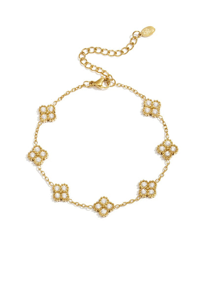 Armbandje goud stainless steel opvallende klavers met steentjes