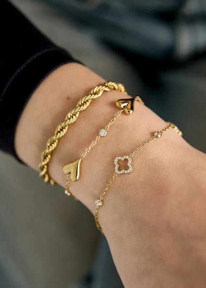 Armbandje open klavertjes clovers goud