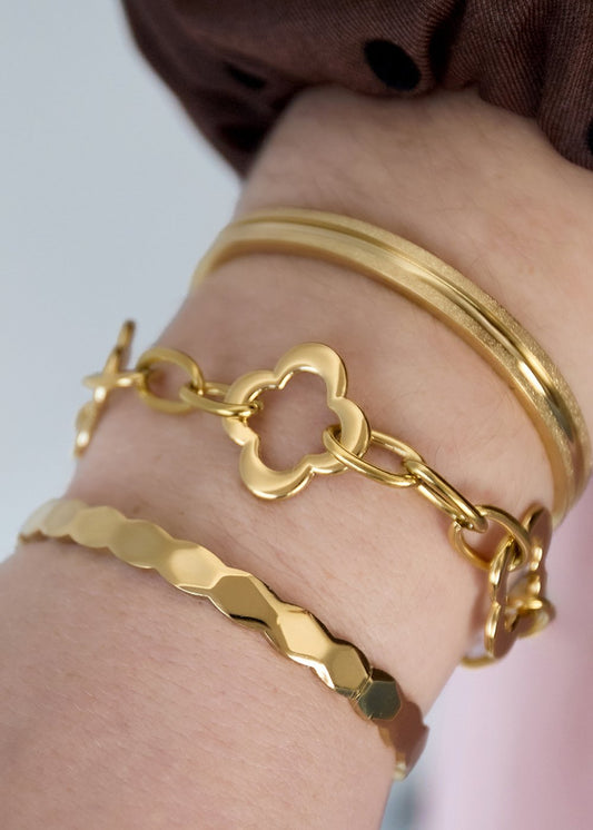 Dikke armband goud clovers rvs