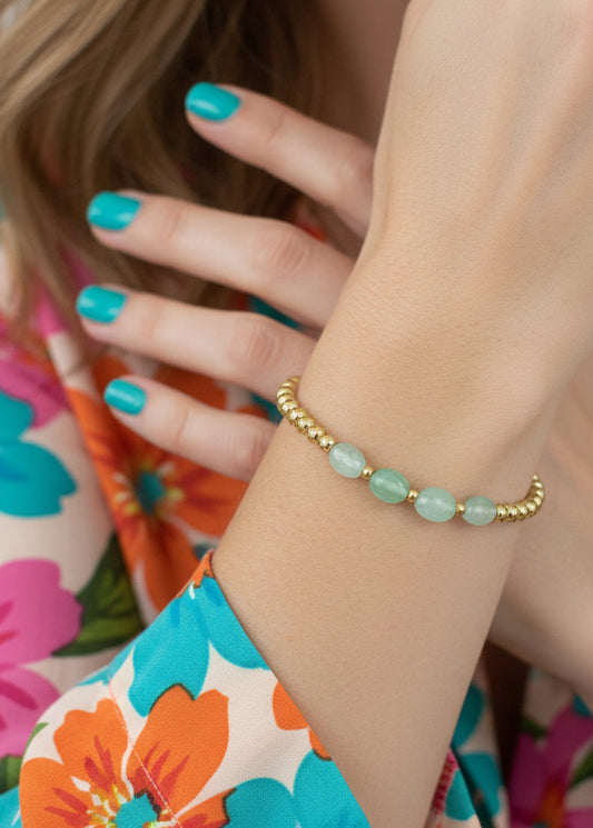 Goud kralenarmbandje turquoise stenen