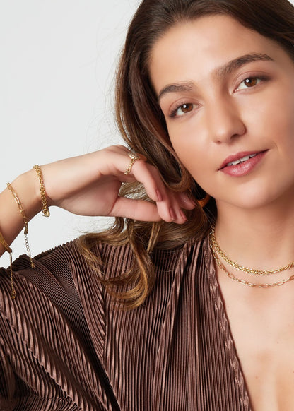 Gouden schakelarmbandje bedels