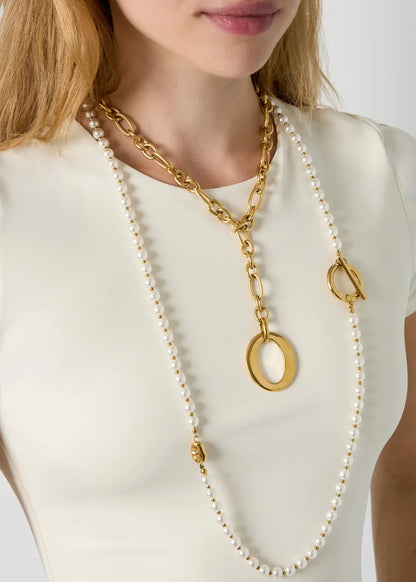 Lange luxe parelketting met gouden tussenstukjes