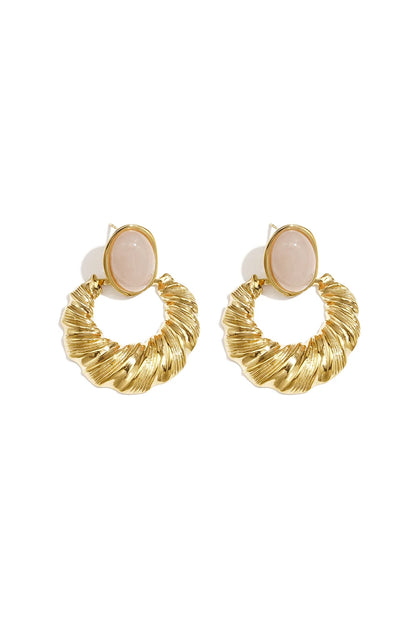 Luxe oorhangers goud gedraaide cirkels steen beige