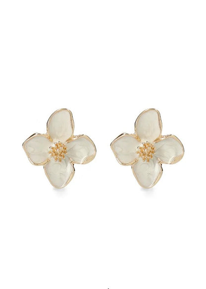 Oorbellen oorstekers witte bloemen met goud