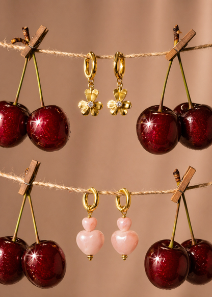Oorringen goud stainless steel hartjes roze
