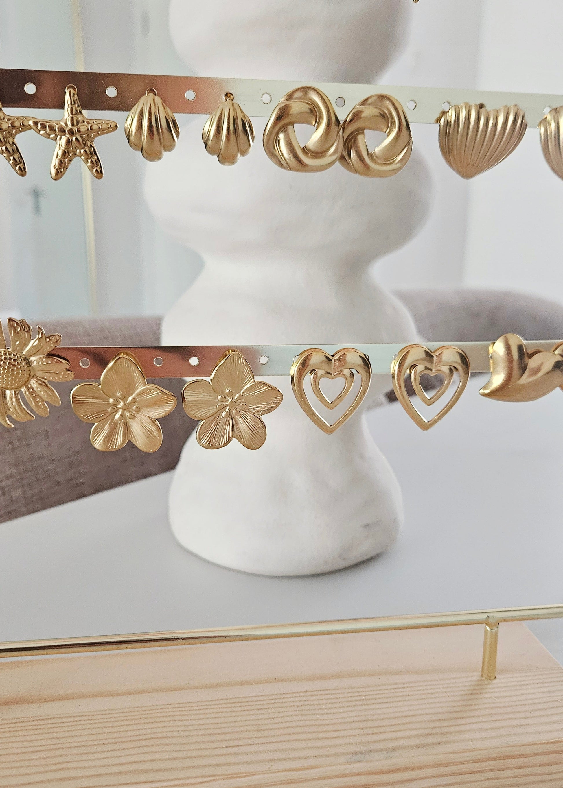 Waterproof gouden lichte oorbellen bloemen en hartjes